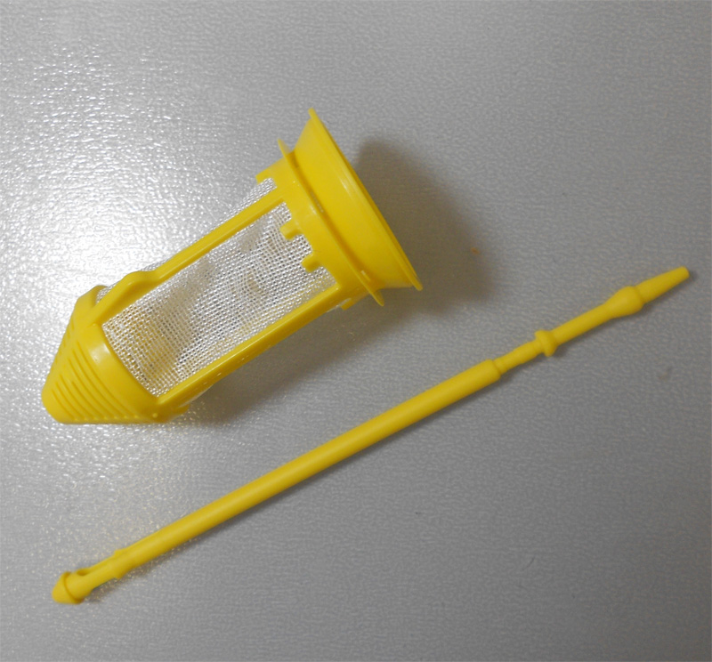 Фильтр DURR вакуумной системы стоматологической установки Planmeca Compact, желтого цвета, сетчатого типа.